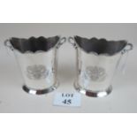 A pair of silver plated oval wine bucket