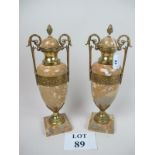 A pair of marble & ormolu lidded urns (n