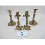Two pairs of brass candlesticks est: £30