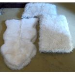 Four sheepskin style rugs to include one