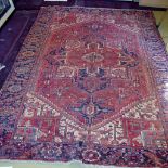A Heriz rug (330 x 230 cm approx) est: £
