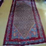 A 20c Afghan rug on blue ground (240 cm x 129 cm approx) est: £10-£20