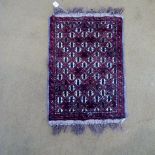 A very small prayer rug (42 x 60 cm) est