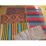 Five small Turkish rugs est: £10-£20