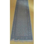 A late 20c blue ground runner est: £10-£