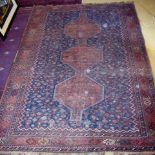 An early 20c Persian carpet on blue ground (300 x 220 cm approx) est: £10-£20