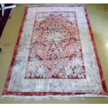 A Chinese silk rug wine & cream good rug