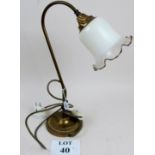 A decorative lamp and glass shade est: £30-£50 (G1)