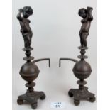A large pair of Victorian metal cherub fire dogs (slightly a/f) (24" tall approx) est: £50-£100