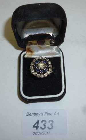 An 18ct white gold diamond and sapphire