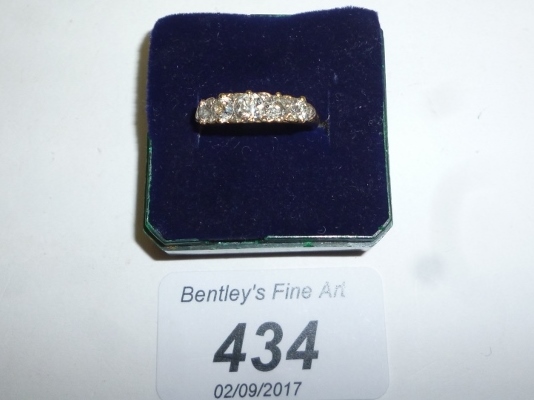 An 18ct five stone graduated diamond rin