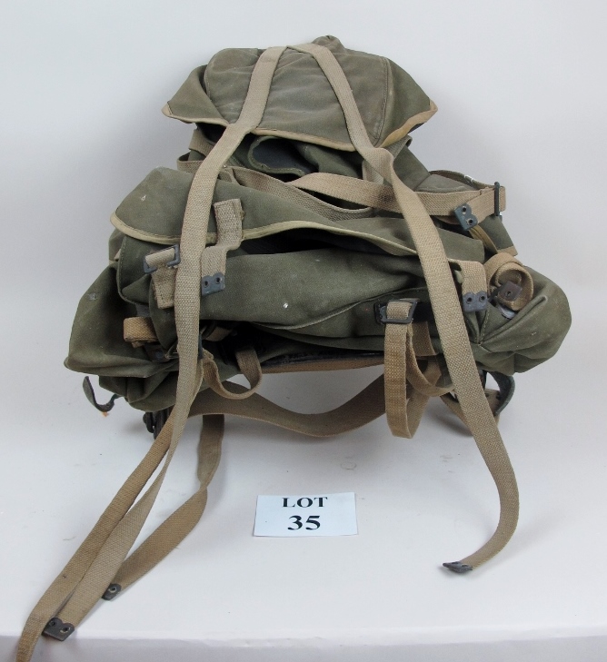 An old canvas rucksack est: £30-£50 (A4)