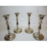 A set of four Georgian silver candlestic