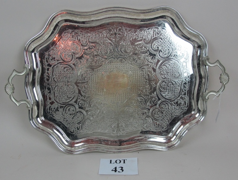 A large silver plated tray est: £25-£45