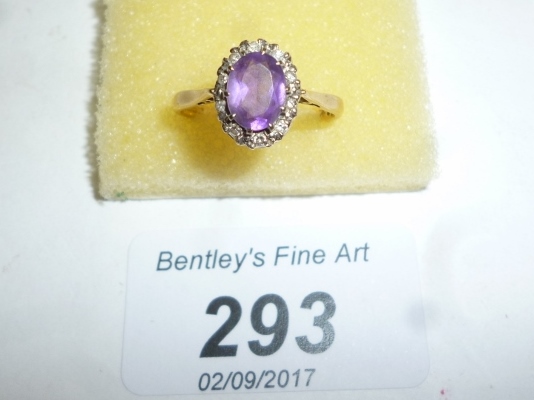 An 18ct gold amethyst and diamond ring (