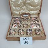 A boxed set of Crown Derby cups & saucers est: £60-£90 (A3)