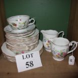 A vintage Queen Anne bone china twenty four piece part tea set and a Bavarian Copeland saucer est: