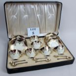 A set of six good quality early 20th century Hammersley cups & saucers with six hallmarked silver