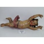 An antique polychrome decorated carved wooden model of a cherub (approx 60 cm) est: £260-£280 (A1)