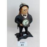 A decorative novelty 'Blinking Eye' figurative mantel clock after the original inscribed 'Bradley &