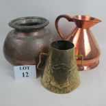 An early 20th century Indian copper pot with engraved decoration,