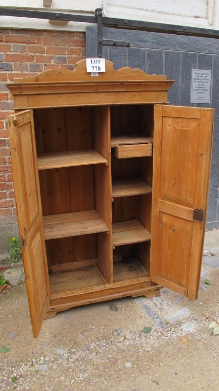 A 19th century pine single wardrobe of small proportions with double panelled doors revealing - Image 2 of 2