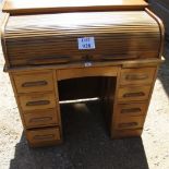 A 19th century oak D type roll top desk with fitted interior over nine drawers est: £80-£120