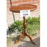 A 20th century mahogany tripod wine table est: £15-£25