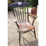 A Victorian elm seated elbow chair est: £40-£60
