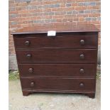 A 19th century mahogany chest of four long drawers with bun handles and terminating on bracket feet