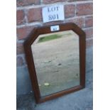A small mahogany framed wall mirror of arched design est: £15-£25
