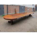 A Victorian walnut pull out dining table,