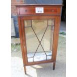 A pretty Edwardian inlaid glazed display cabinet with single drawer to top and terminating on