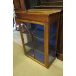 A pale mahogany glazed wall display cabinet est: £30-£50