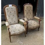 Two Victorian mahogany framed armchairs upholstered in matching cream floral material est:
