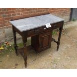 A 19th century mahogany washstand with grey veined marble top over two drawers and a single