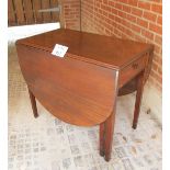 An early 20th century mahogany drop leaf table with end drawer over square tapering legs est: