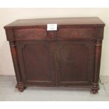 A Victorian mahogany chiffonier sideboard with two drawers to top over cupboard doors flanked