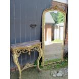 A 19th century French gilt console table with a marble top and with a large decorative mirror to