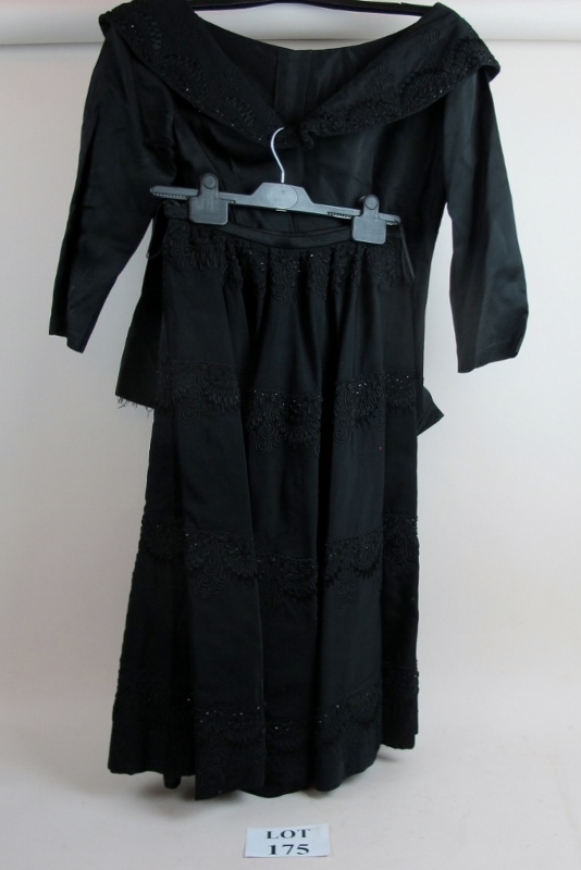 A black ladies top and skirt vintage est