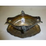 A French double lip sauce boat on fixed