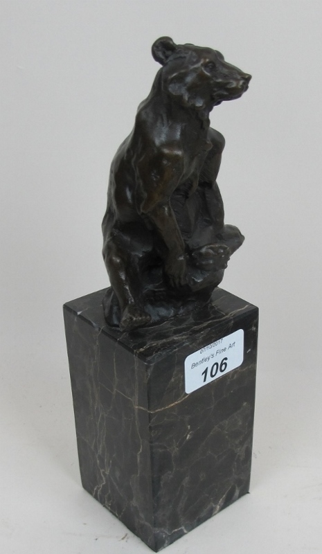 A bronze study of a bear on marble plint