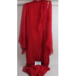 A long ladies red dress est: £30-£50 (C)