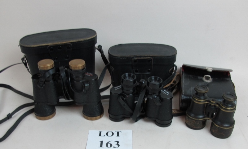 Two pairs of binoculars and a pair of fi