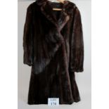 An old ladies fur coat est: £30-£50 (C)