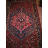 An early-mid 20th century Persian rug on