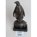 A contemporary bronze group of penguins,
