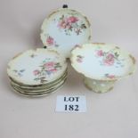 A Limoges cake stand and six matching pl