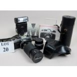 A Olympus Omid camera, Tamaron lense, Tamaron adaptall, cases,