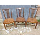 Three 19th century oak chairs with solid seats and pierced back splat's est: £50-£80